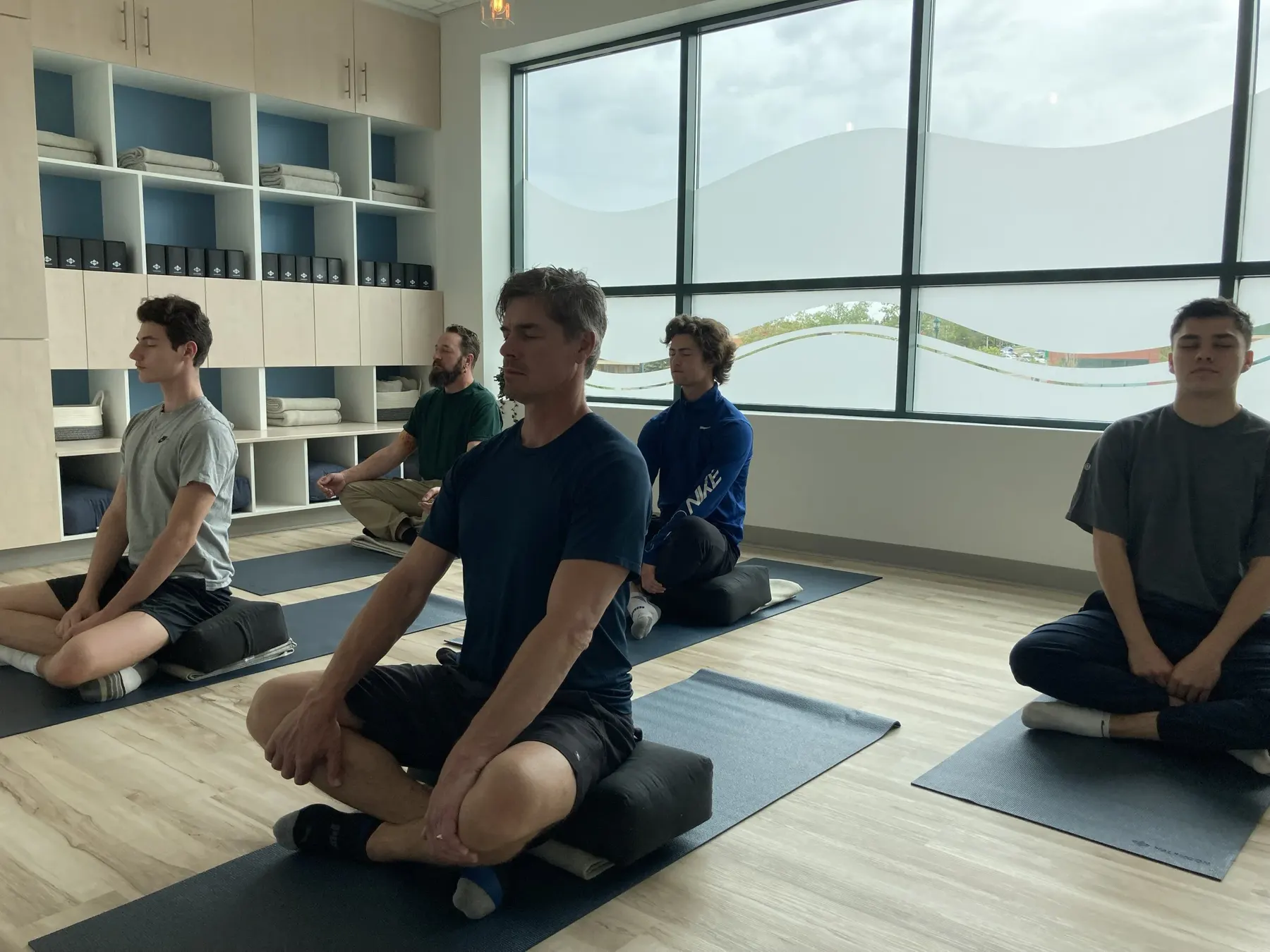 A group resting together during a guided session